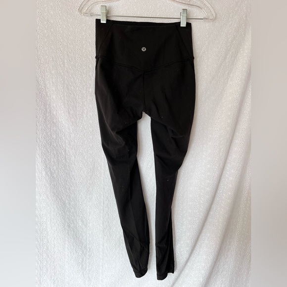 Lululemon black crop leggings with side panel detail size 4 - Picture 3 of 4